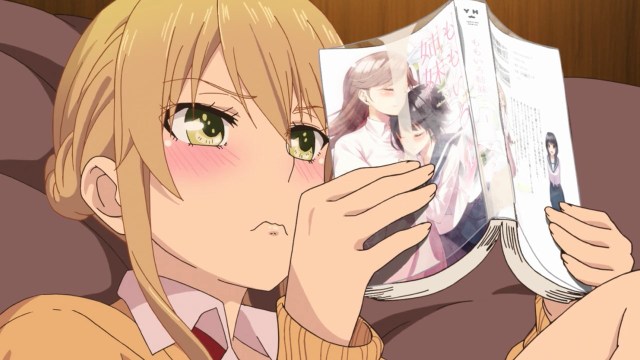 Yuzu reading a siscon Yuri manga.jpg